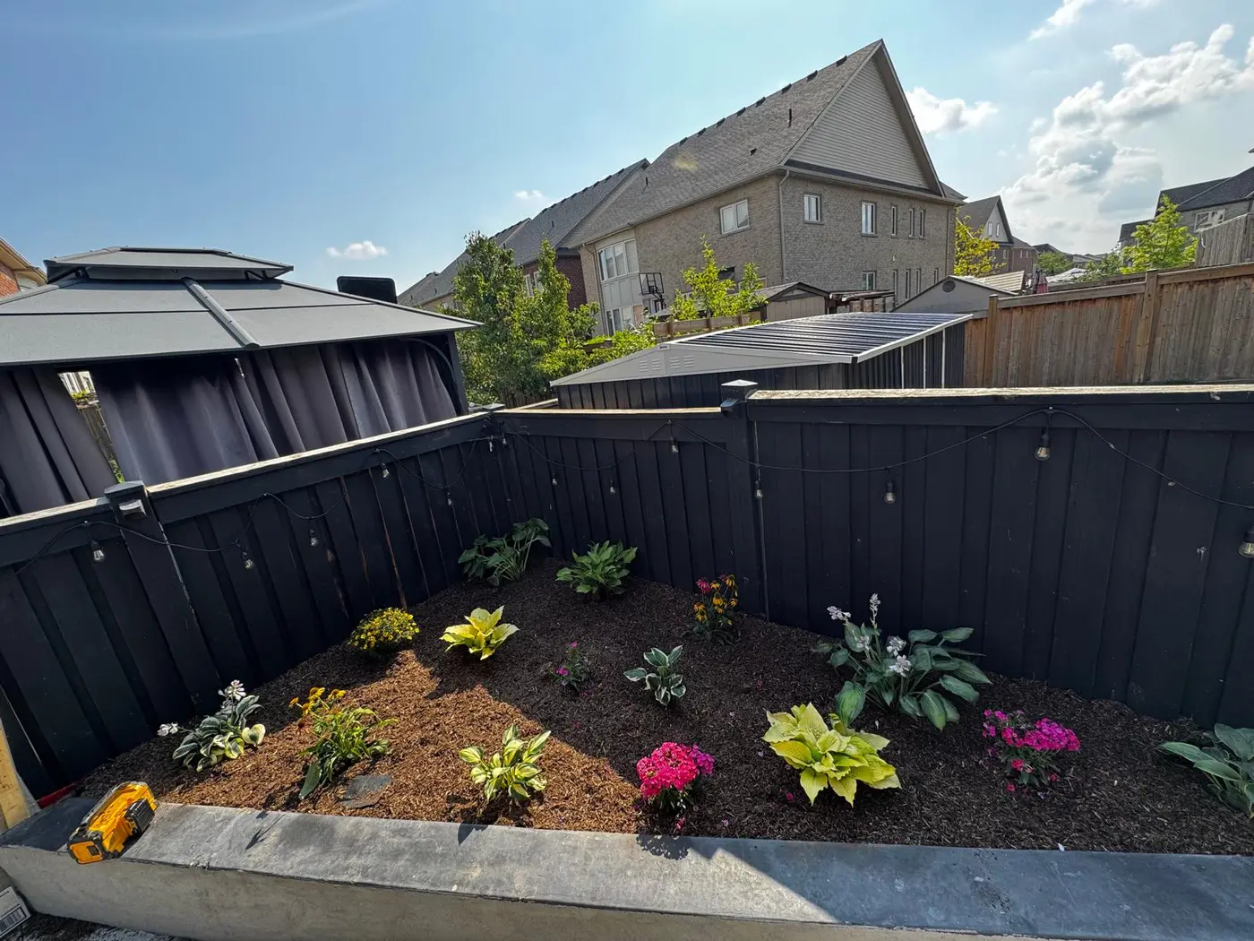 Completed garden bed, mulch and planting project